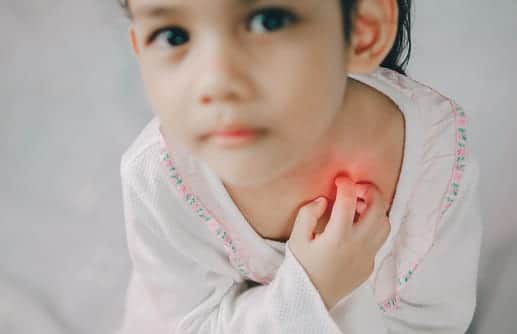 asia young girl scratch the itch with hand ,neck, itching