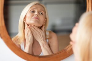 Double,Chin,Treatment.,Middle,Aged,European,Woman,Touching,Soft,Smooth