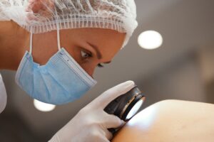 A,Dermatologist,Examines,The,Skin.,High,Quality,Photo