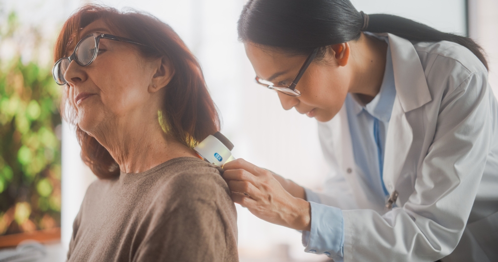 Middle,Aged,Female,Passing,A,Medical,Examination,By,A,Young